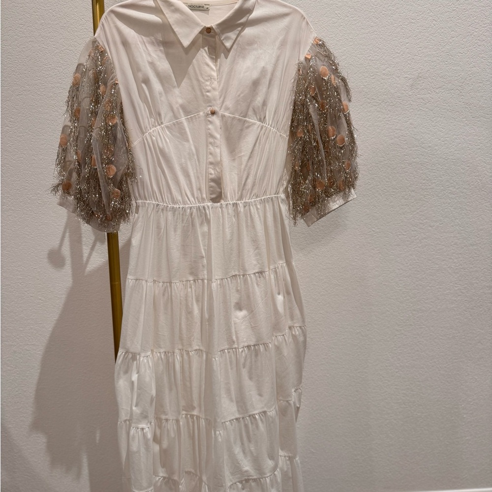Elegant White Dress with Embellished Sleeves